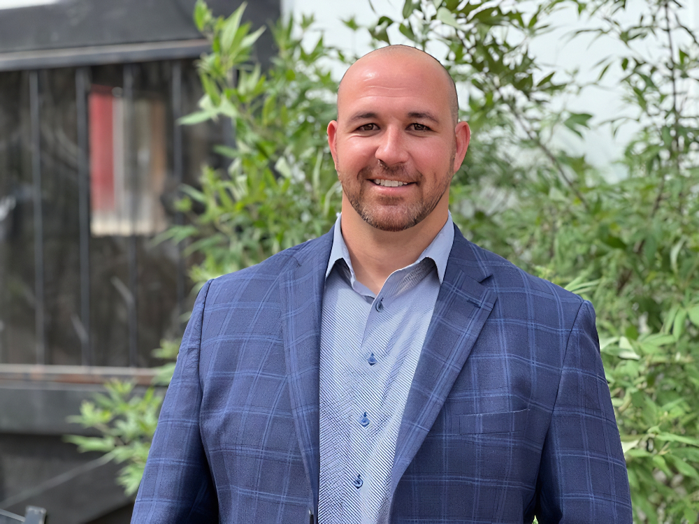 Certified detailer from Brightside Detailing cleaning a car in Austin, TX